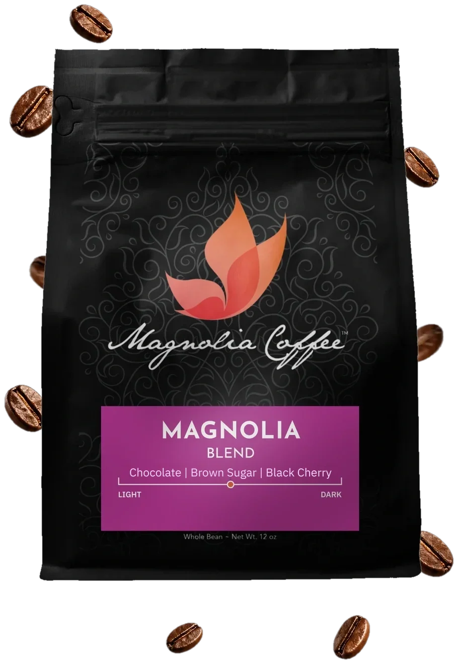 Magnolia Blend bag with coffee beans scattering around it